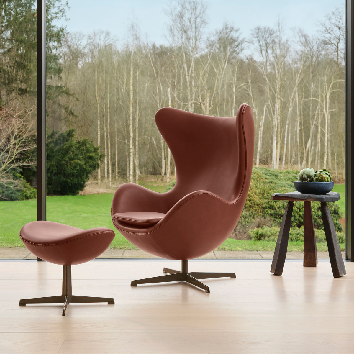 Egg Lounge Chair by Fritz Hansen, showing egg lounge chair in live shot.