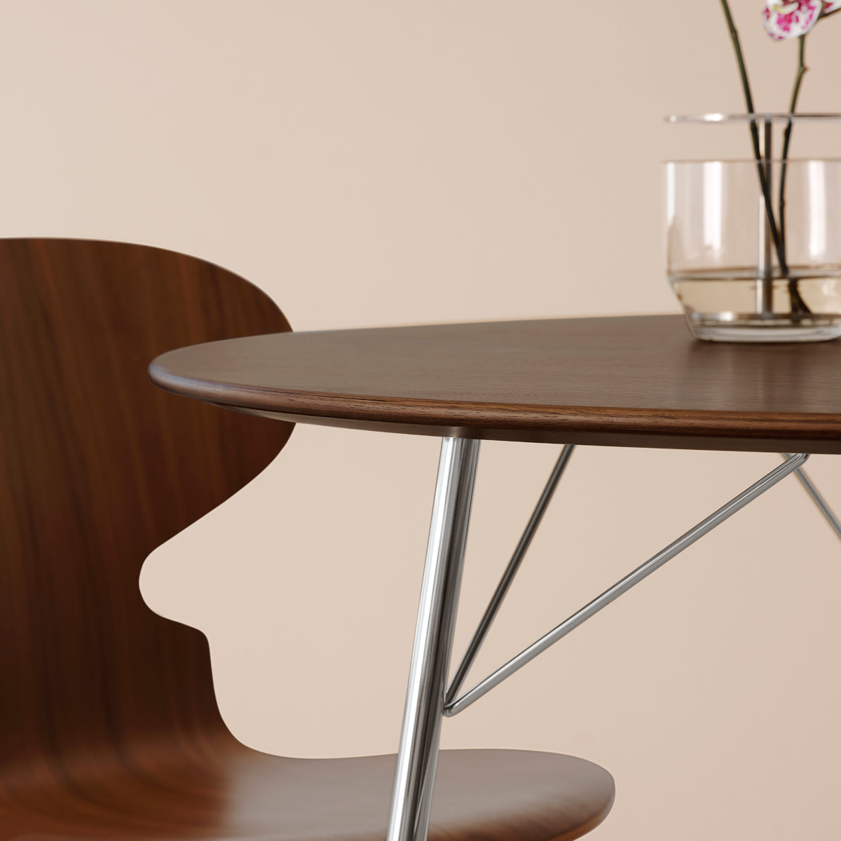 Egg Table by Fritz Hansen, showing closeup view of egg table in live shot.