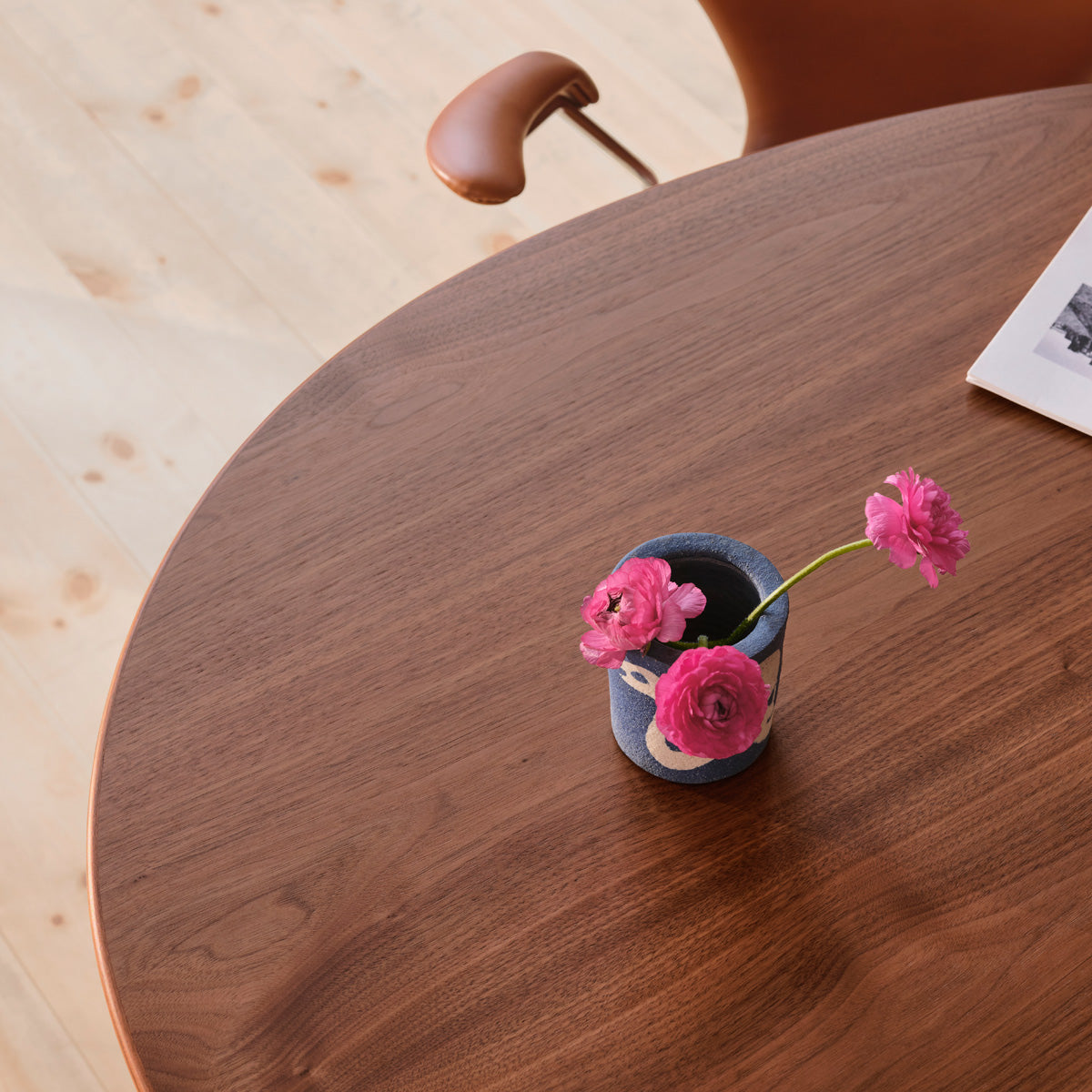 Egg Table by Fritz Hansen, showing closeup view of egg table in live shot.