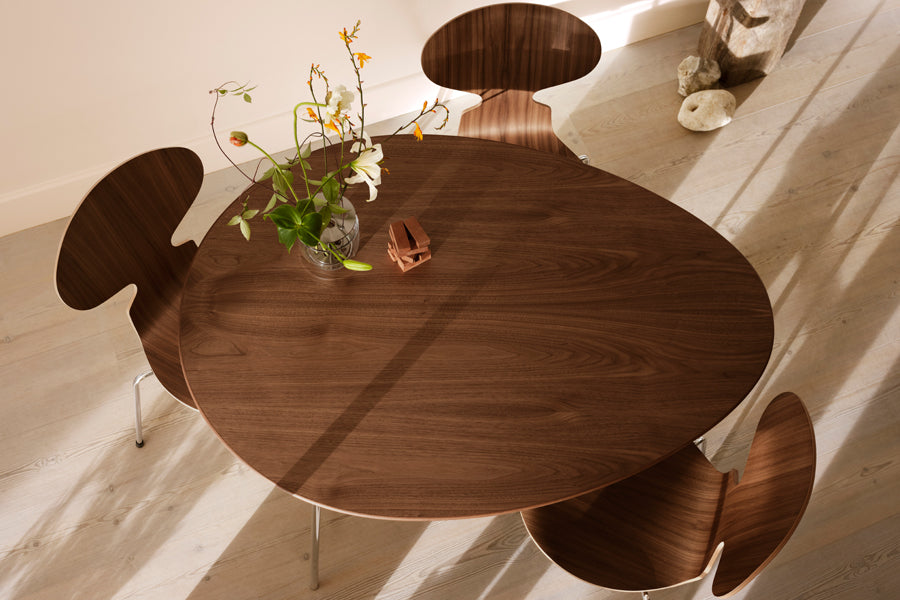 Egg Table by Fritz Hansen, showing egg table in live shot.