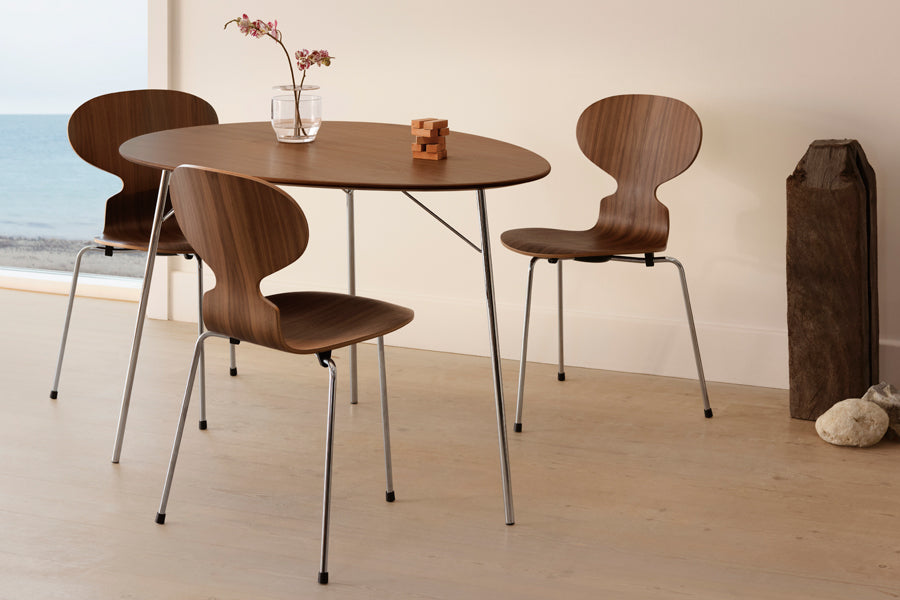 Egg Table by Fritz Hansen, showing egg table in live shot.