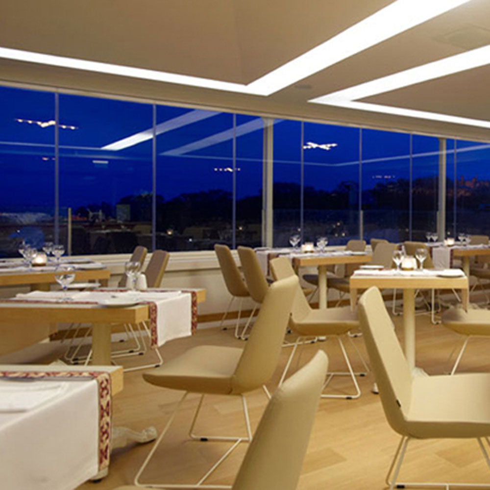 Eiffel Wire Dining Chair-Fabric by SohoConcept, showing eiffel wire dining chairs in live shot.