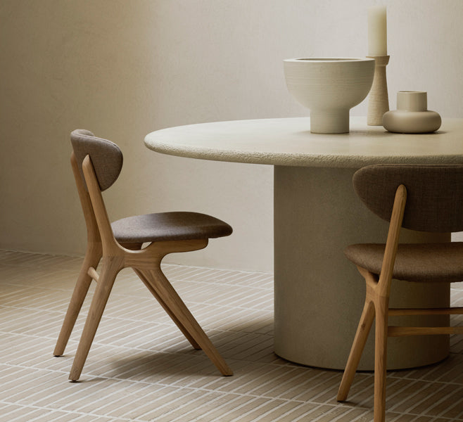 Elements Dining Table by Ethnicraft, showing closeup view of elements dining table in live shot.