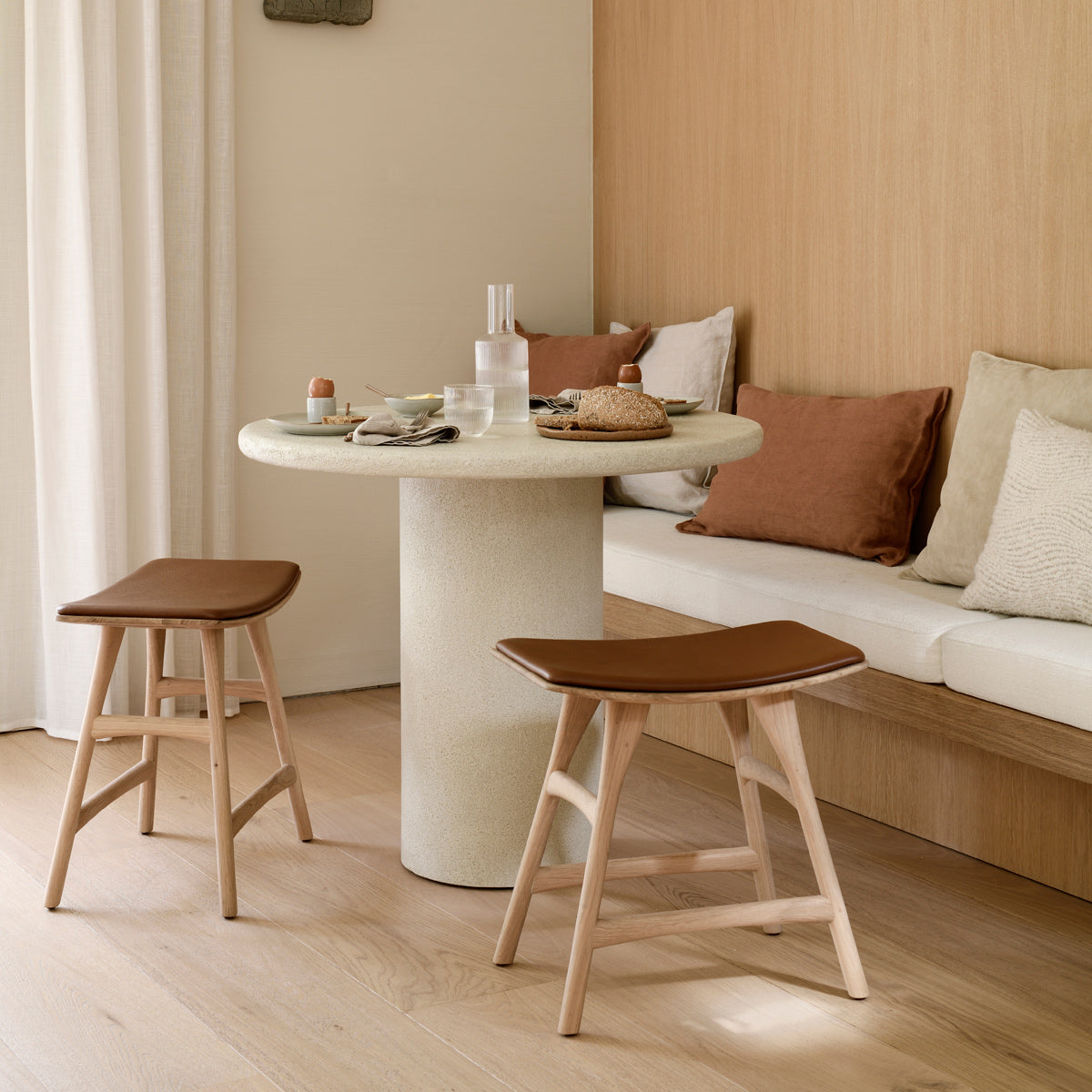 Elements Dining Table by Ethnicraft, showing elements dining table in live shot.