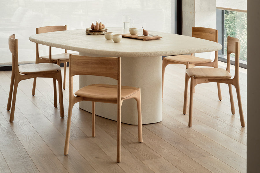 Elements Dining Table by Ethnicraft, showing elements dining table in live shot.