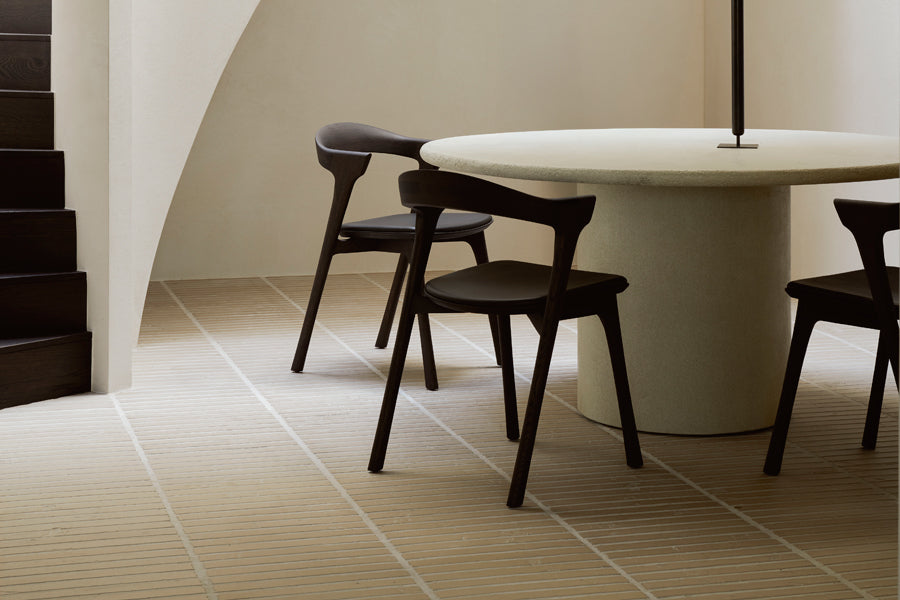 Elements Dining Table by Ethnicraft, showing elements dining table in live shot.