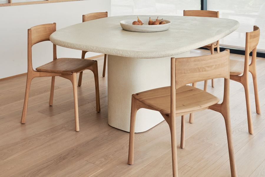 Elements Dining Table by Ethnicraft, showing elements dining table in live shot.