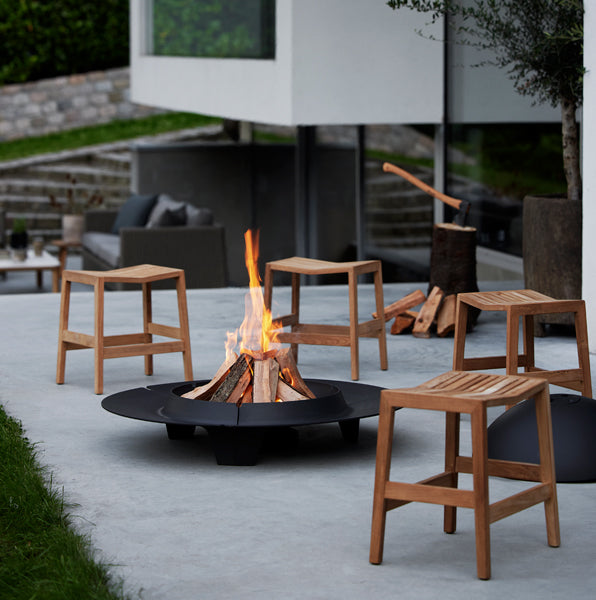 Ember Fire Pit by Cane-Line, showing ember fire pits in live shot.