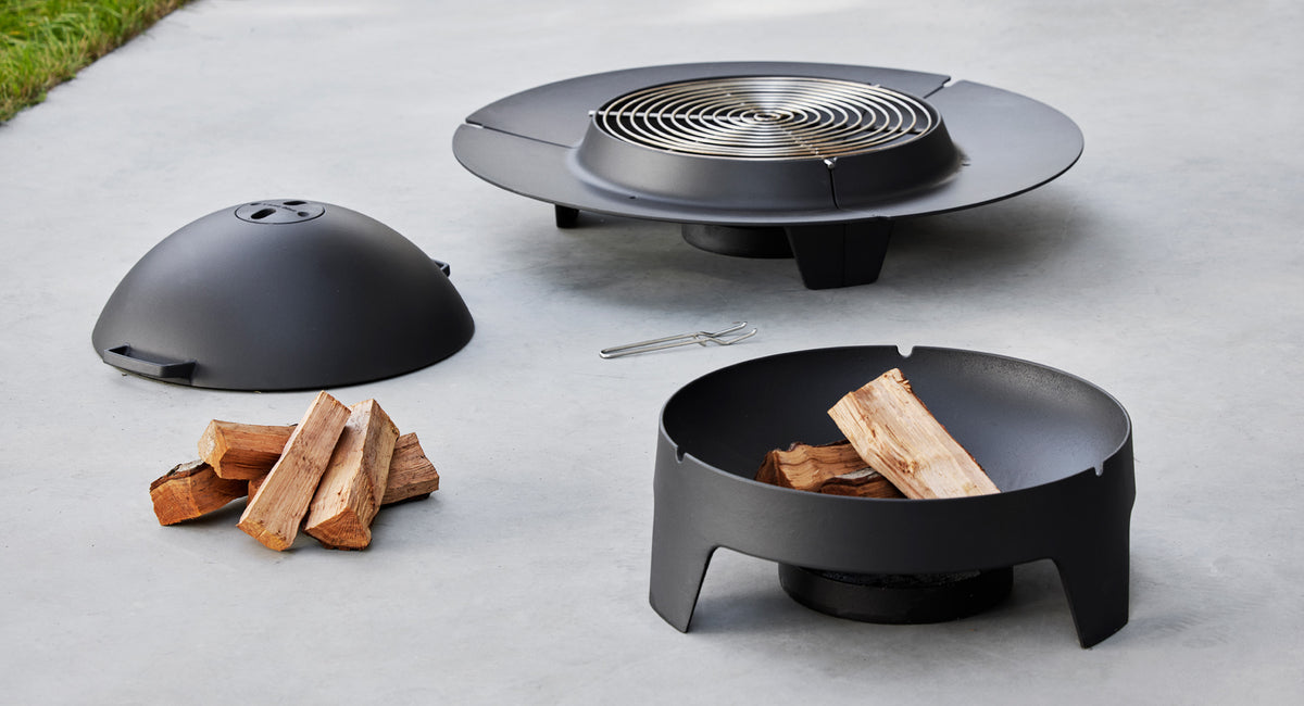 Ember Fire Pit by Cane-Line, showing ember fire pits in live shot.