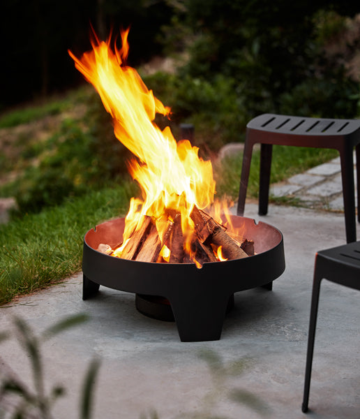 Ember Fire Pit by Cane-Line, showing ember fire pit in live shot.