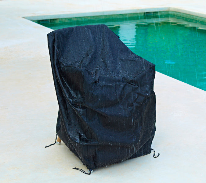 Endless Outdoor Dining Chair by Cane-Line, showing cover for endless outdoor dining chair in live shot.