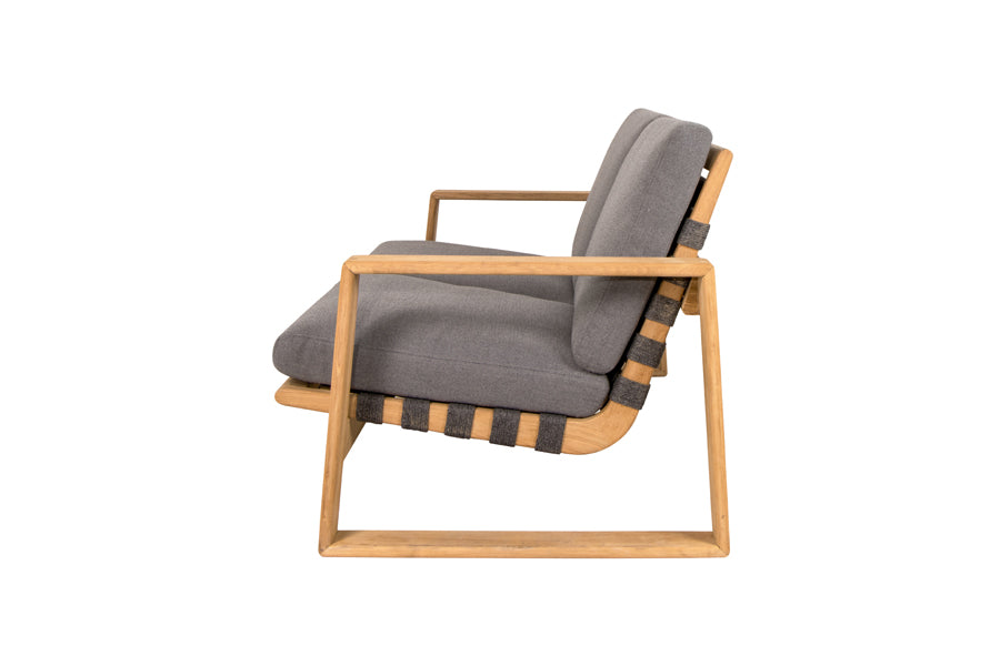 Endless Soft 2-Seater Sofa by Cane-Line, showing side view of endless soft 2-seater sofa in dark grey soft rope/teak/grey airtouch cushion set.