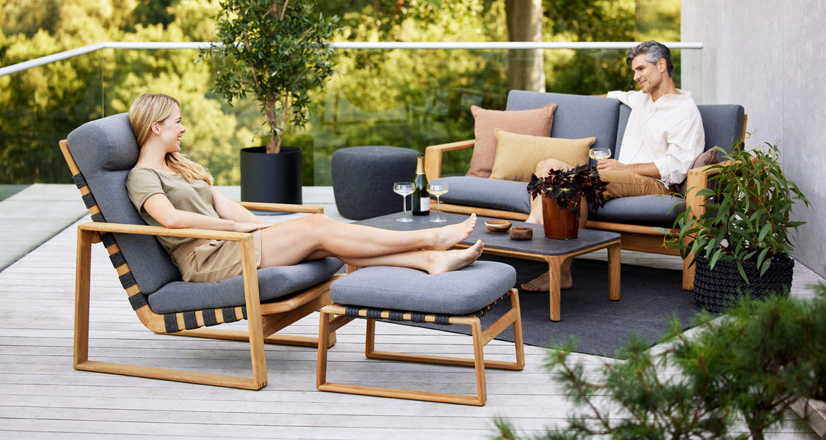 Endless Soft Footstool by Cane-Line, showing endless soft footstool in live shot.