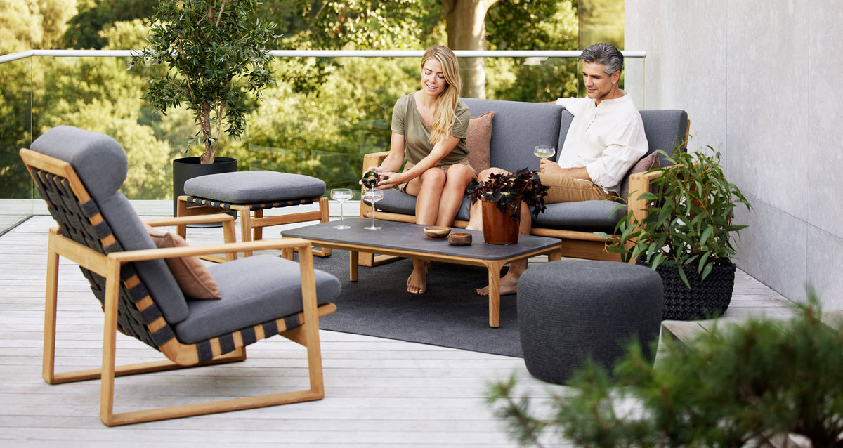 Endless Soft Highback Chair by Cane-Line, showing endless soft highback chair in live shot.