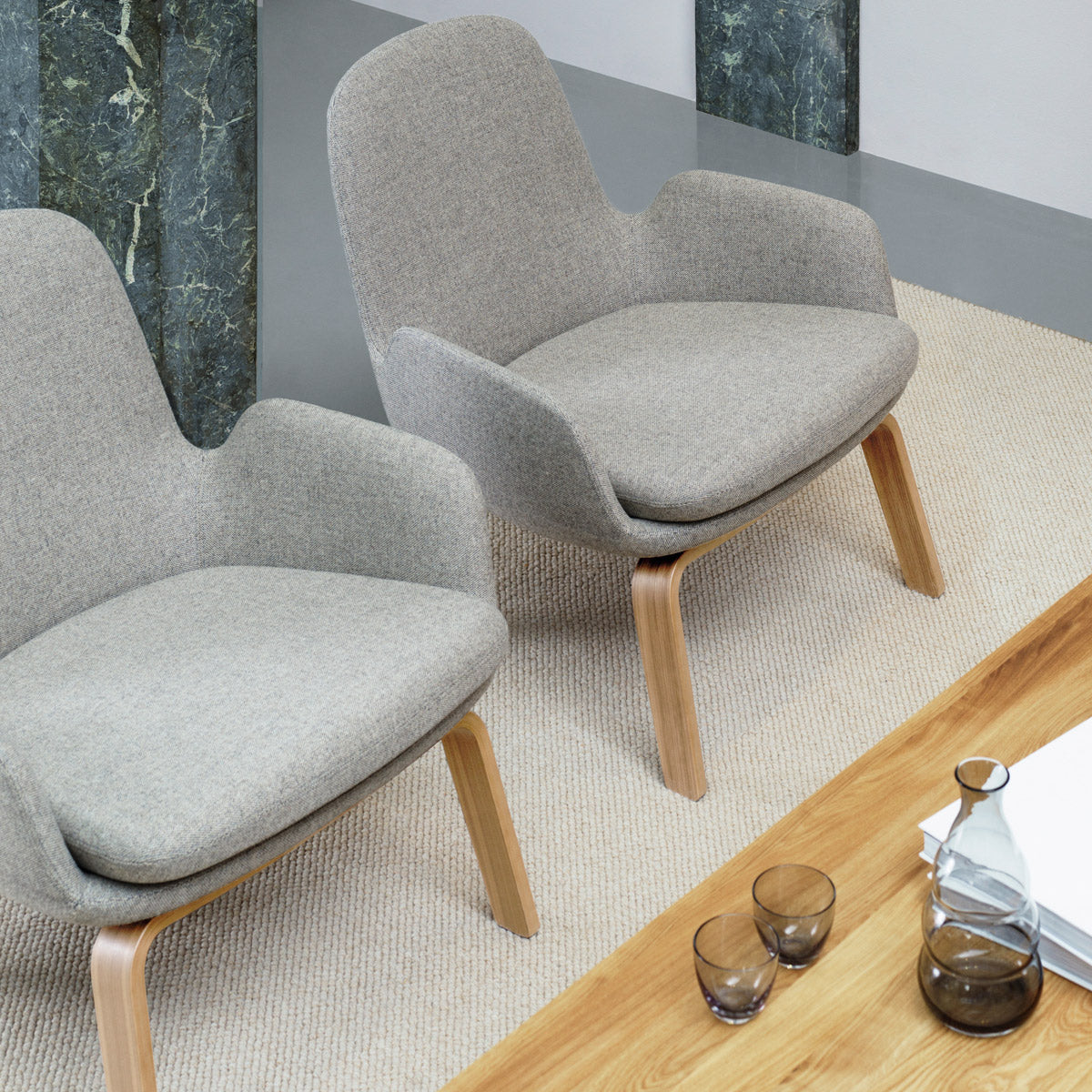 Era Lounge Chair by Normann Copenhagen, showing era lounge chairs in live shot.