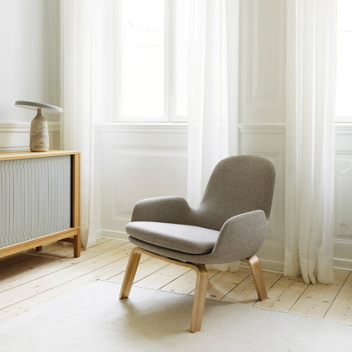 Era Lounge Chair by Normann Copenhagen, showing era lounge chair in live shot.
