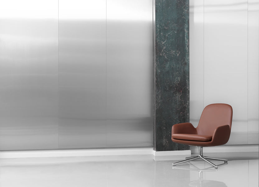 Era Lounge Swivel Alu Chair by Normann Copenhagen, showing era lounge swivel alu chair in live shot.