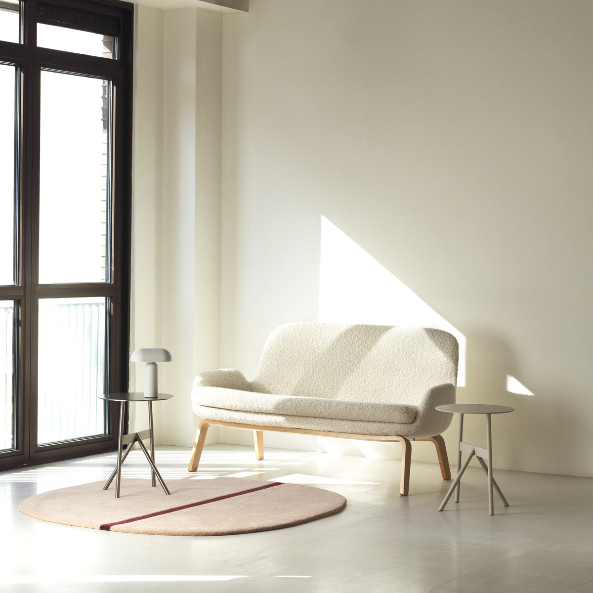 Era Sofa by Normann Copenhagen, showing era sofa in live shot.