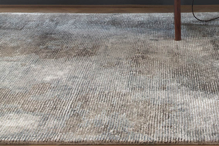 Erode Hand Tufted Rug by Ligne Pure, showing closeup view of erode hand tufted rug in live shot.
