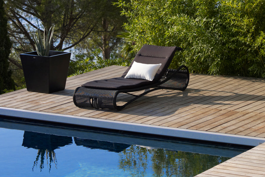 Escape Sunbed by Cane-Line, showing escape sunbed in live shot.