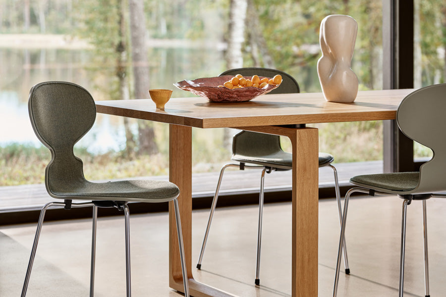 Essay Table by Fritz Hansen, showing essay table in live shot.