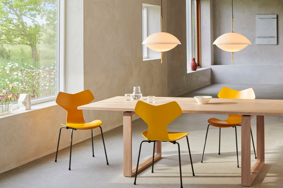 Essay Table by Fritz Hansen, showing essay table in live shot.