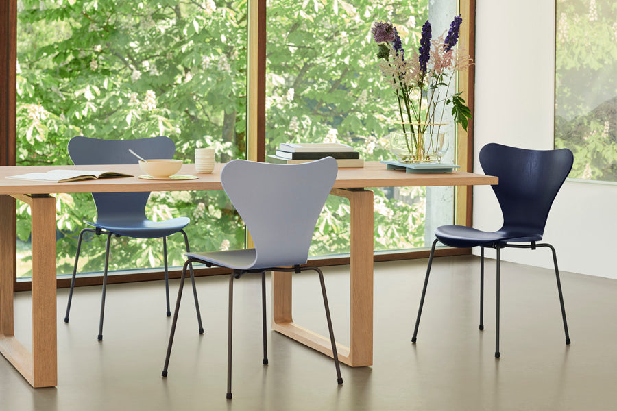 Essay Table by Fritz Hansen, showing essay table in live shot.