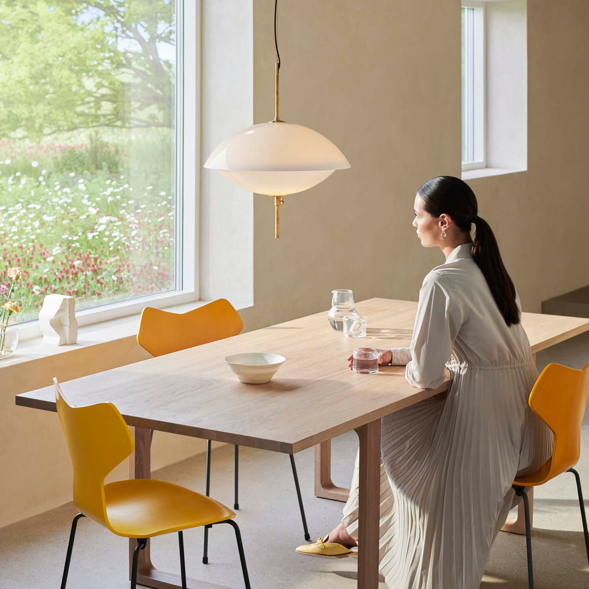 Essay Table by Fritz Hansen, showing essay table in live shot.
