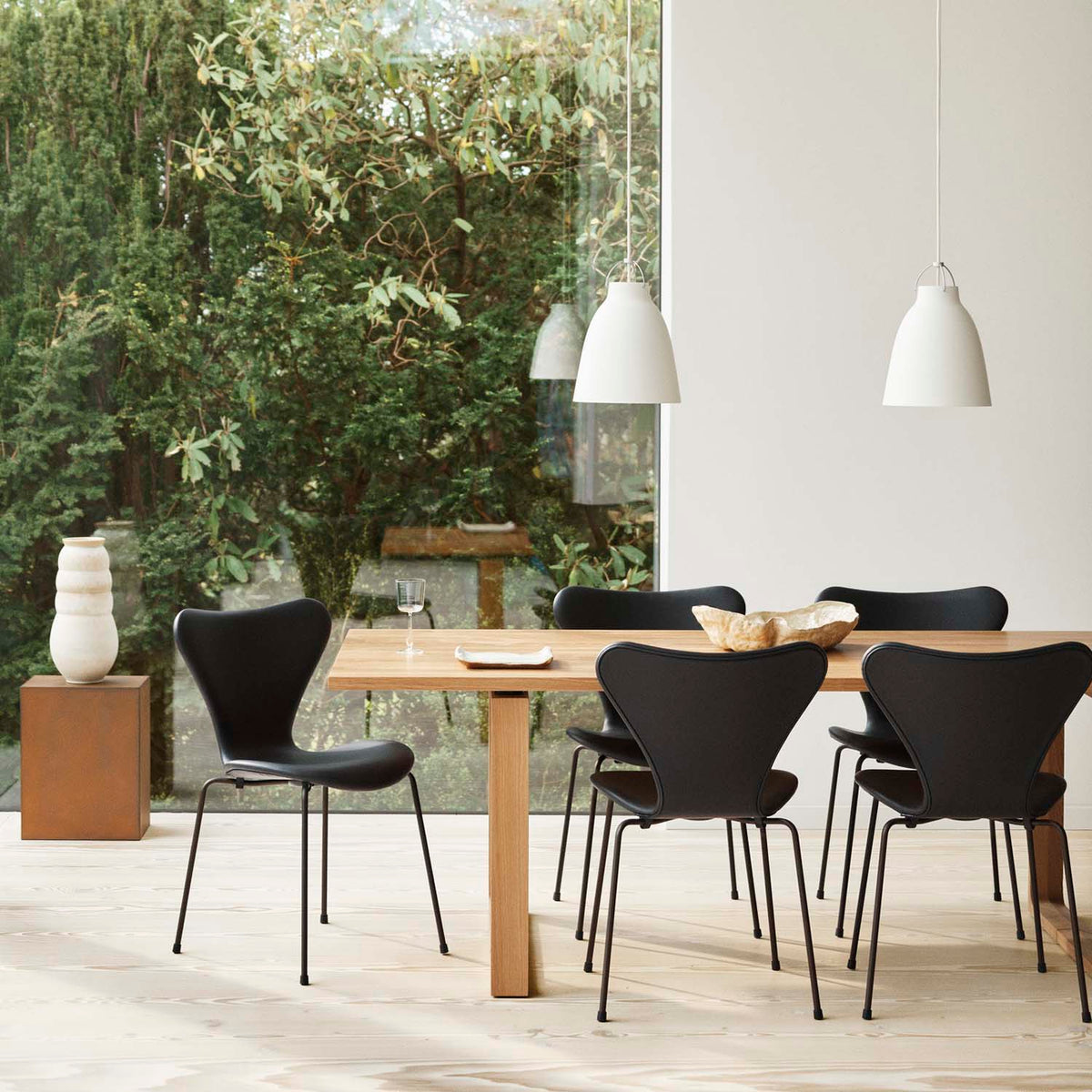 Essay Table by Fritz Hansen, showing essay table in live shot.