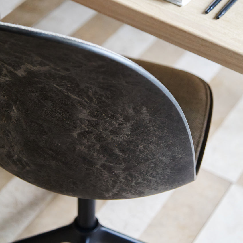 Eternity Swivel Chair by Mater, showing closeup view of eternity swivel chair in live shot.