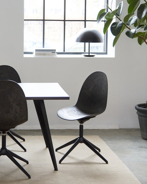 Eternity Swivel Chair by Mater, showing eternity swivel chairs in live shot.
