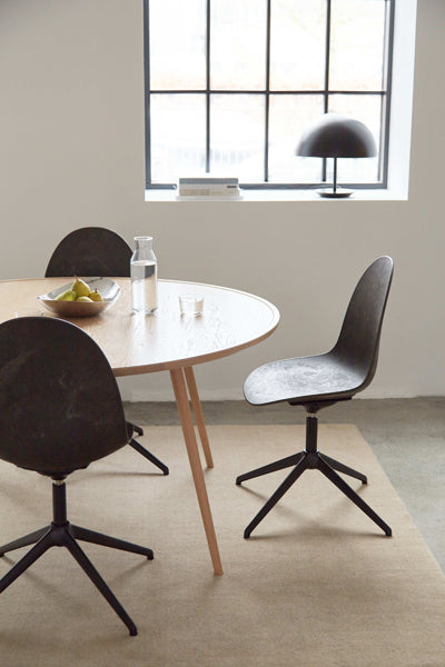 Eternity Swivel Chair by Mater, showing eternity swivel chairs in live shot.