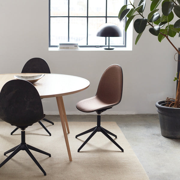 Eternity Swivel Chair by Mater, showing eternity swivel chairs in live shot.
