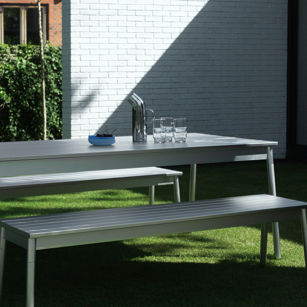 Ex Table by Normann Copenhagen, showing closeup view of ex table in live shot.