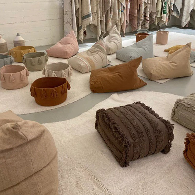 Exclusive Air Pouf by Lorena Canals, showing exclusive air pouf in live shot.