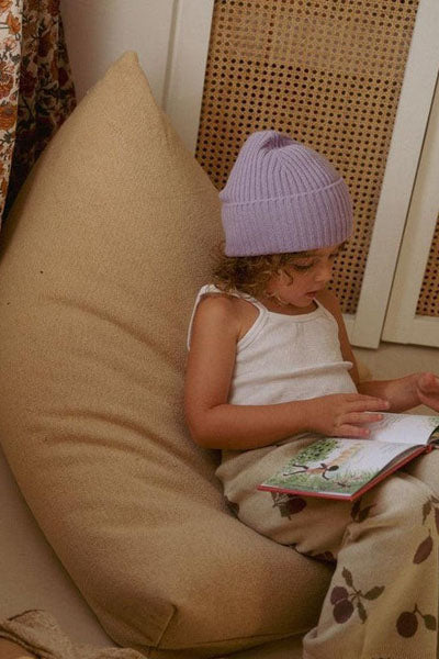Exclusive Cleo Pouf by Lorena Canals, showing exclusive cleo pouf in live shot.