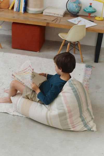 Exclusive Cleo Pouf by Lorena Canals, showing exclusive cleo pouf in live shot.