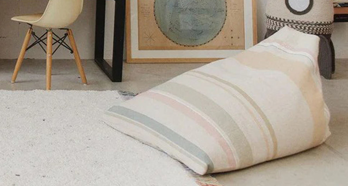Exclusive Cleo Pouf by Lorena Canals, showing exclusive cleo pouf in live shot.