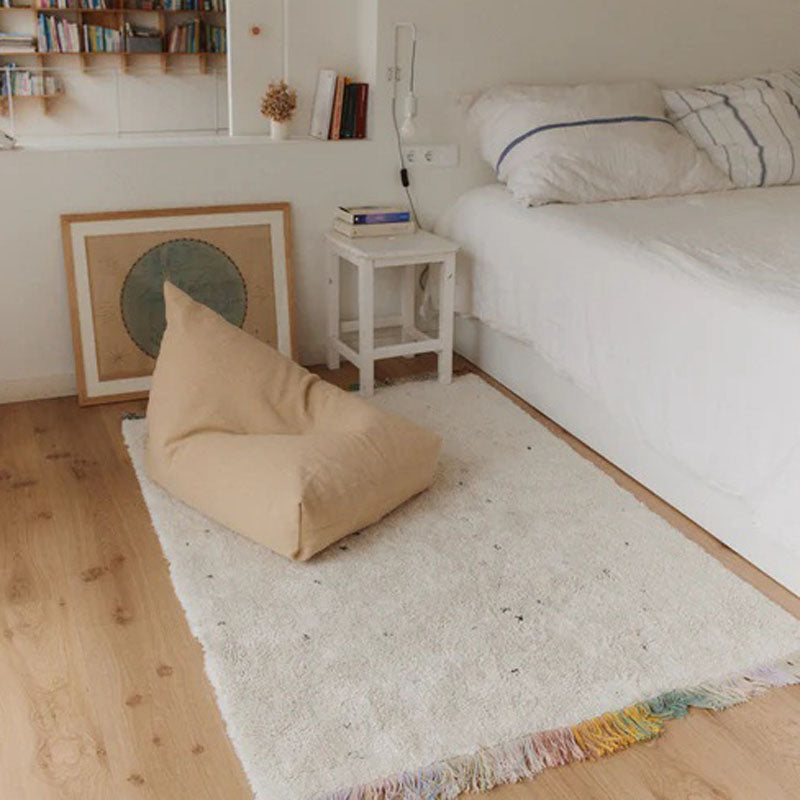 Exclusive Cleo Pouf by Lorena Canals, showing exclusive cleo pouf in live shot.