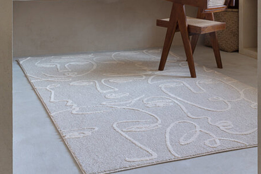 Faces Woven Rug by Ligne Pure, showing faces woven rug in live shot.