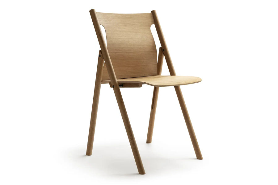 Faneeri Folding Chair by Nikari, showing angle view of faneeri folding chair.