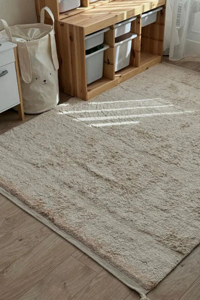 Fantasy Garden Washable Rug by Lorena Canals, showing fantasy garden washable rug in live shot.
