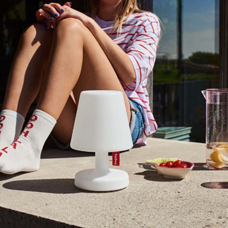 Edison The Petit Table Lamp by Fatboy, showing edison the petit table lamp in live shot.