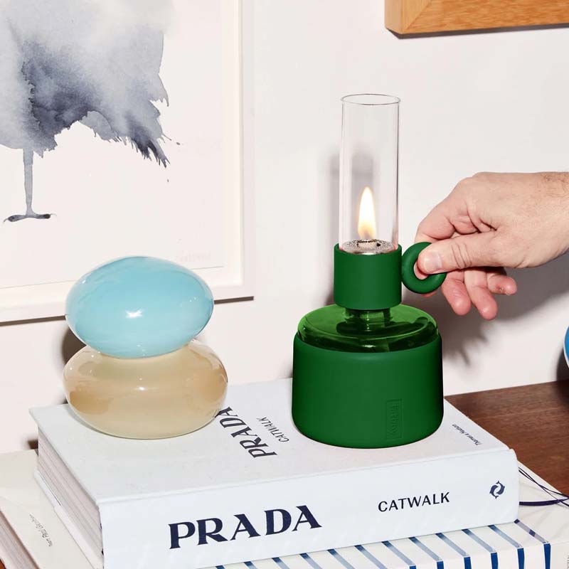 Flamtastique XS Oil Lamp by Fatboy, showing flamtastique xs oil lamp in live shot.