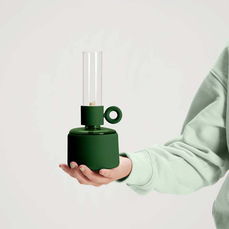 Flamtastique XS Oil Lamp by Fatboy, showing flamtastique xs oil lamp in live shot.