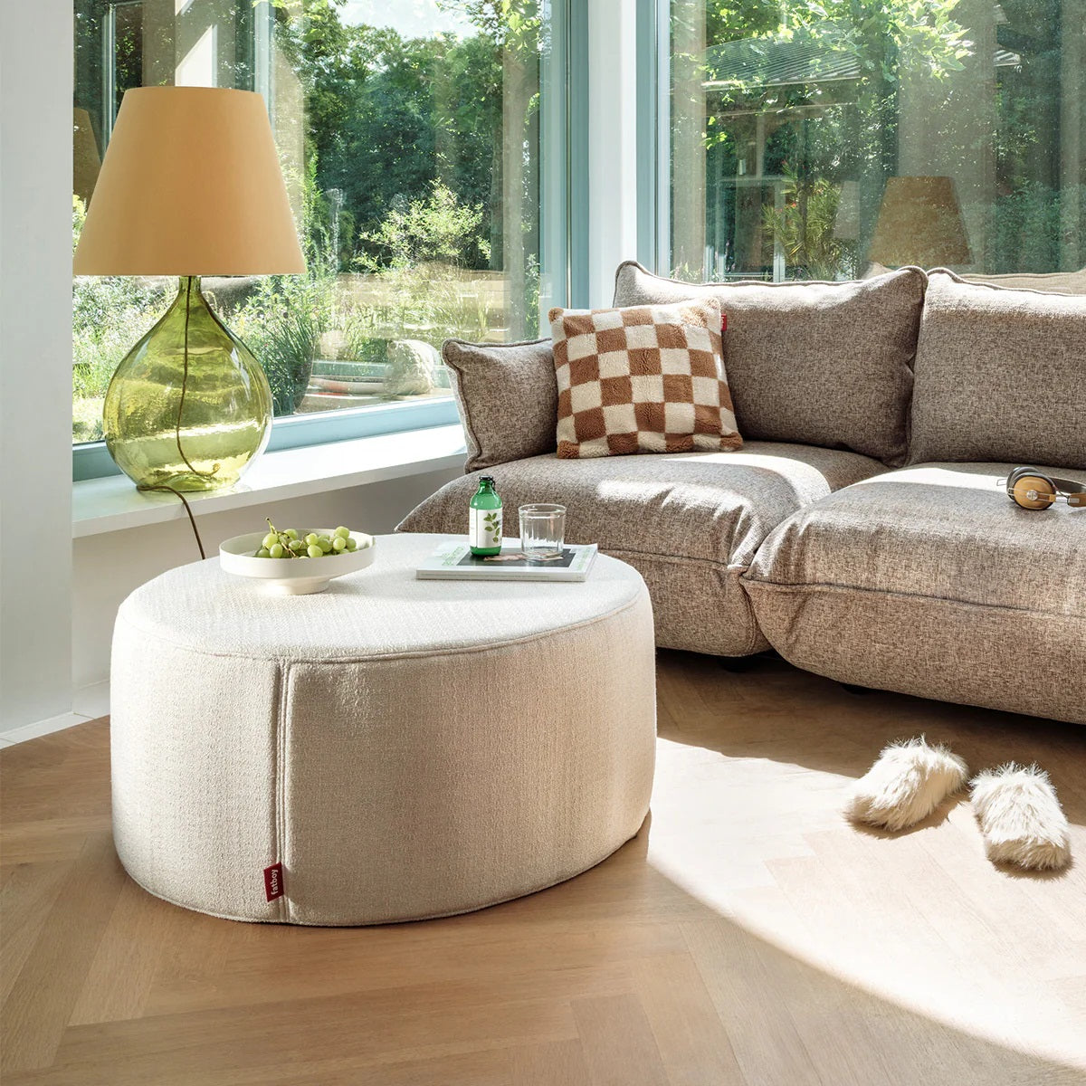 Pfffh Recycled Boucle Ottoman by Fatboy, showing pfffh recycled boucle ottoman in live shot.