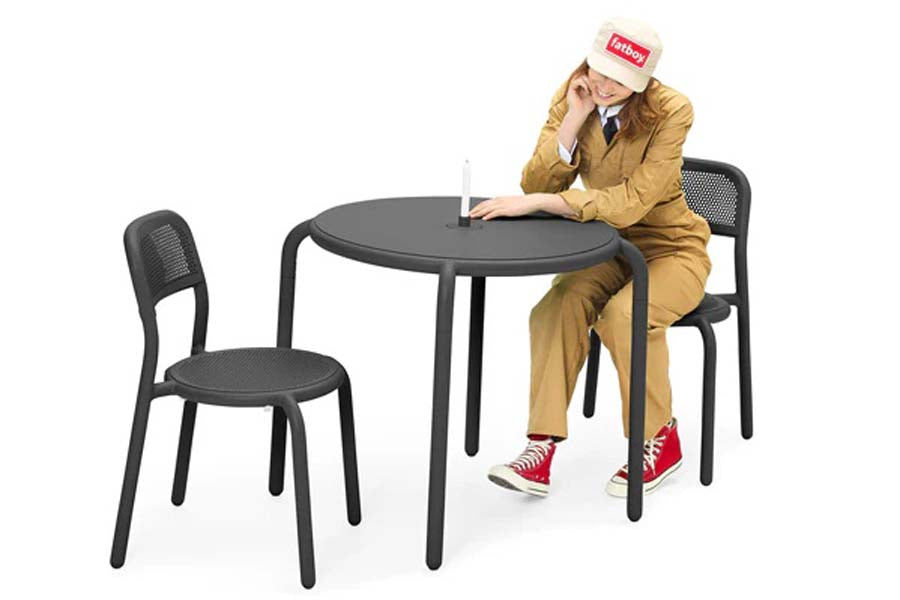 Toni Bistreau Outdoor Table by Fatboy, showing toni bistreau outdoor table with chair.