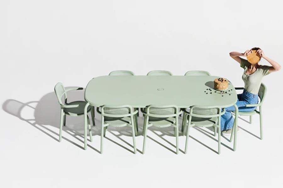 Toni Tablo Outdoor Dining Table by Fatboy, showing toni tablo outdoor dining table in live shot.