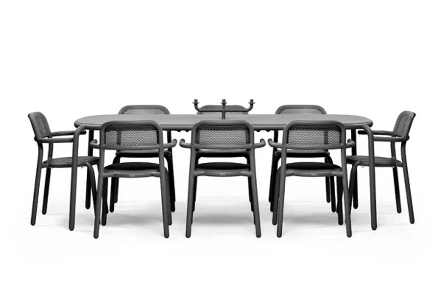 Toni Tablo Outdoor Dining Table by Fatboy, showing toni tablo outdoor dining table with chair.
