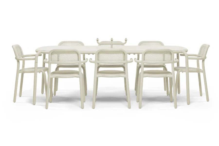 Toni Tablo Outdoor Dining Table by Fatboy, showing toni tablo outdoor dining table with chair.
